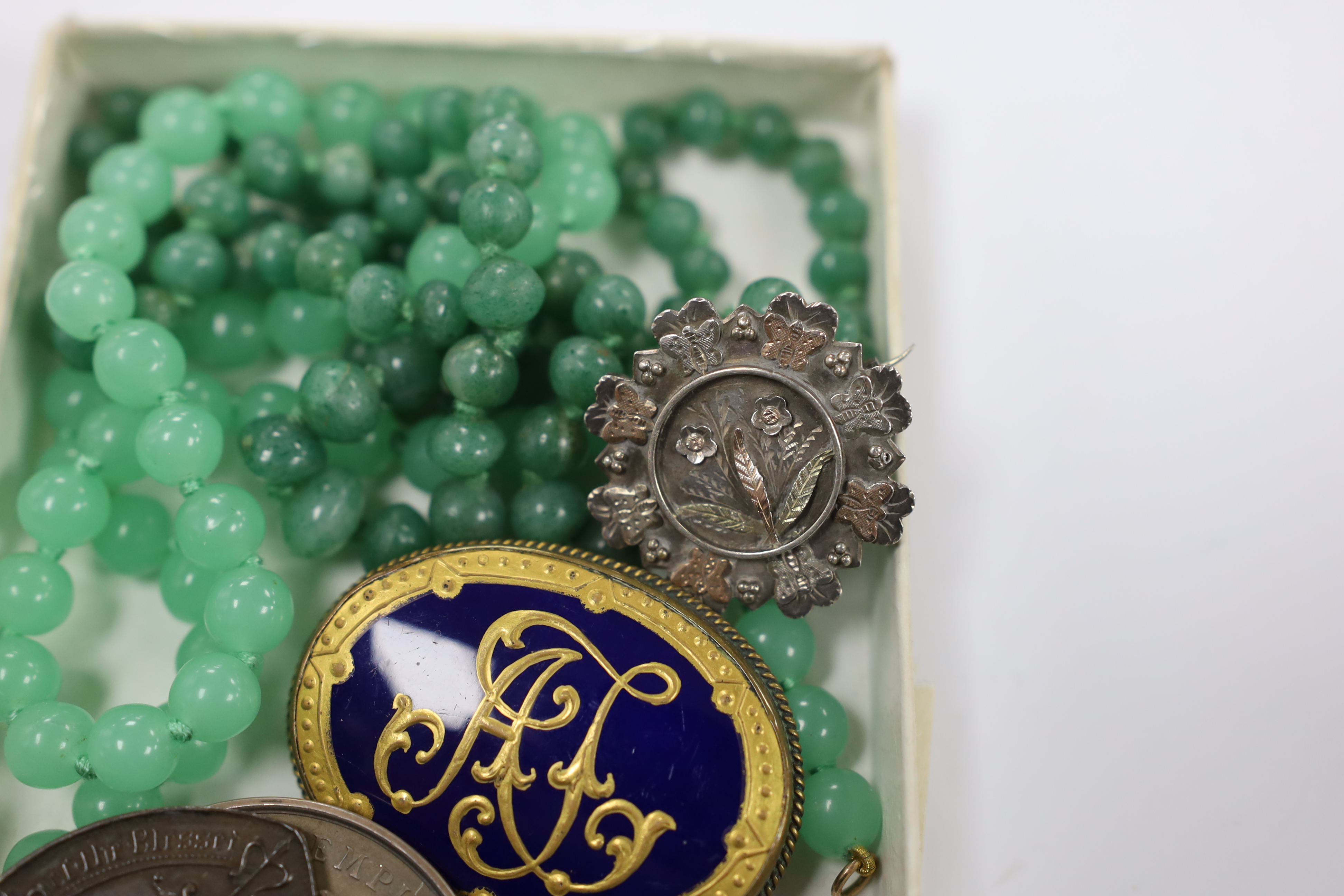 Sundry jewellery etc. including two simulated jade necklaces, a late Victorian silver brooch, a silver compass fob on a silver albert and an Art Nouveau style enamelled white meal drop pendant.